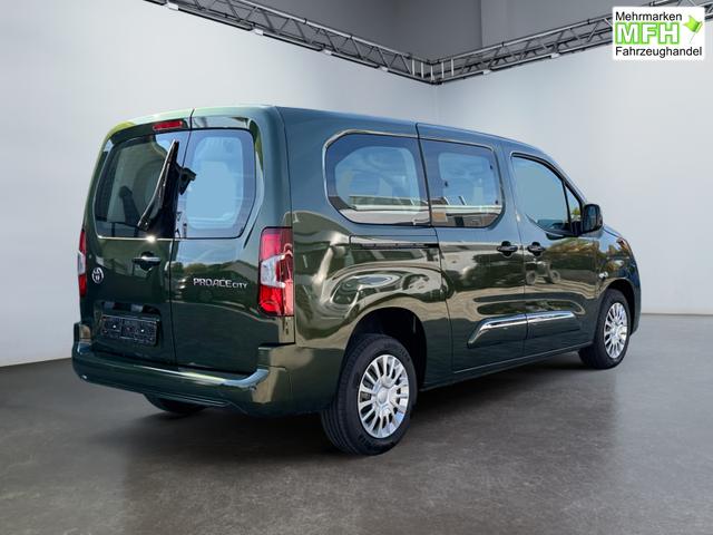 Toyota Proace City Verso 1,2 L2 Business 7 Sitzer Klima Einparkhilfe Apple Tempomat DAB 10 Zoll Display Regensensor 