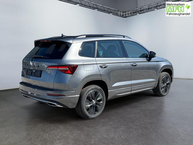 Skoda Karoq 2,0 TDI DSG Sportline 3ZKlima ACC 4x Sitzheizung 2x Einparkhilfe Anh&auml;ngerkupplungKamera 5J Garantie beheizte Windschutzscheibe 