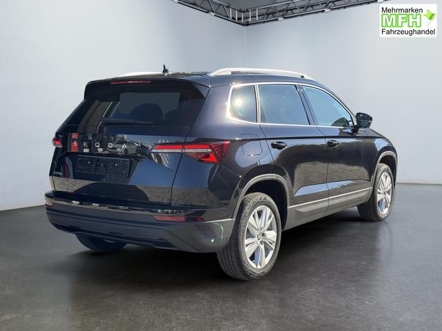Skoda Karoq Extra Plus 1,5 TSI DSG 2Zoklima 2xEinparkhilfe AHK Kamera Sitzheizung beheiztes Lenkrad 