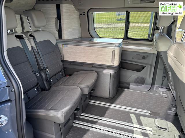 Volkswagen T7 California Beach 2.0 TSI 204PS DSG (AUTOMATIK), Aufstelldach, Klimaanlage, Parksensoren vorne und hinten, Digital Cockpit Pro, Radio Ready2Discover 10" + Wireless App-Connect, SIDE ASSIST, ACC, LED-Scheinwerfer, M-Lederlenkrad, Schiebetüren links rechts 