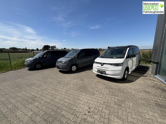 Volkswagen T7 California Beach 2.0 TSI 204PS DSG (AUTOMATIK), Aufstelldach, Klimaanlage, Parksensoren vorne und hinten, Digital Cockpit Pro, Radio Ready2Discover 10" + Wireless App-Connect, SIDE ASSIST, ACC, LED-Scheinwerfer, M-Lederlenkrad, Schiebetüren links rechts 