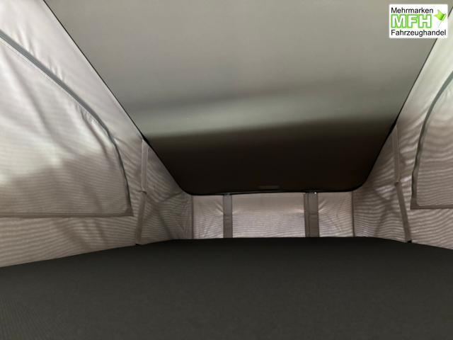 Volkswagen T7 California Beach Tour 2.0 TDI 150PS DSG, 5 Sitzer + 4 Schlafplätze, Drehsitze vorn, Privacy-Glas, Technikbox 230V, Aufstelldach, Klima, Parksensoren, Radio Ready2Discover App-Connect, M-Lederlenkrad, Schiebetüre links/rechts, Digital Cockpit, ACC/Tempomat, SIDE ASSIST 