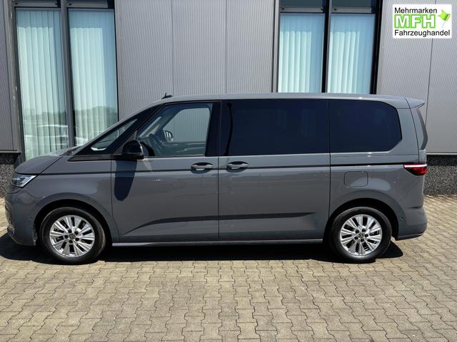 Volkswagen T7 Multivan Style 2.0 TSI 204PS DSG, 5 Jahre VW-Garantie, 7-Sitzer, IQ.LIGHT LED-MATRIX-SCHEINWERFER, 3-ZONEN-CLIMATRONIC, Alarm, Digital Cockpit Pro, Sitzheizung, 17" Alu, R&uuml;ckfahrkamera, Park Assist, Parksensoren vorn & hinten, Elektr. Schiebet&uuml;re links rechts 