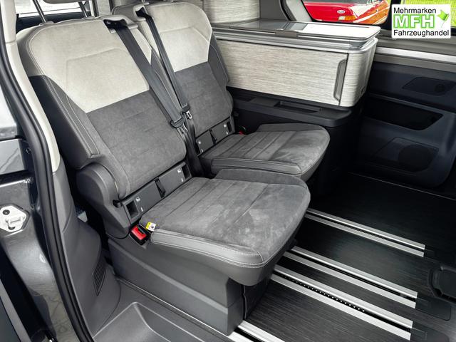 Volkswagen T7 California Beach 2.0 TSI 204PS DSG (AUTOMATIK), Aufstelldach, Klimaanlage, Parksensoren vorne und hinten, Digital Cockpit Pro, Radio Ready2Discover 10" + Wireless App-Connect, SIDE ASSIST, ACC, LED-Scheinwerfer, M-Lederlenkrad, Schiebetüren links rechts 