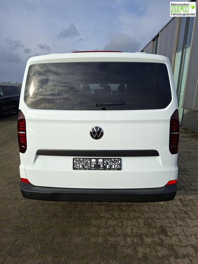 Volkswagen T7 Kombi Basis 2.0 TDI 150PS, 1-Zonen-Klimaautomatik, Parksensoren hinten, Privacy-Glas, 70l-Tank, Radio 13" + Wireless App-Connect, Tempomat, Digitales Cockpit, Keyless Start, Schiebet&uuml;re rechts 