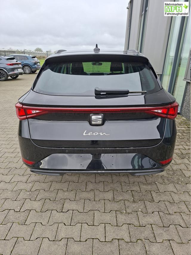 Seat Leon Sportstourer Style 1.5 TSI 115PS, SCHWARZ-METALLIC, 5 Jahre Garantie, 16" ALU, MATRIX-LED, Privacy-Glas, Winter-Paket, 3-Zonen-Climatronic, ParkAssist, Parksensoren v/h, R&uuml;ckfahrkamera, Radio 10,4" + Full-Link, Tempomat, M-Lederlenkrad, variabler Ladeboden 