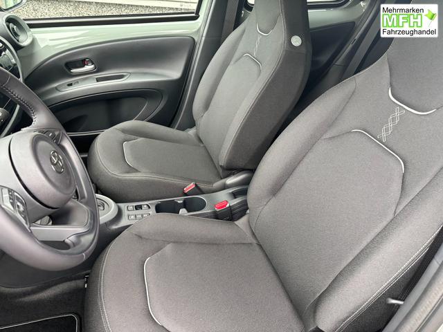 Toyota Aygo X Pulse 1.5 Hybrid 115PS CVT/AUTOMATIK, 3 Jahre Garantie, 17" Alufelgen, Metallic/Dach schwarz, Privacy-Glas, Sitzheizung, R&uuml;ckfahrkamera, Klimaautomatik, Audiosystem 9" + Smartphone-Integration, Lederlenkrad, ACC, ZV mit Fernbedienung, LED-Scheinwerfer 