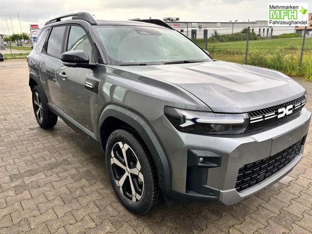 Dacia Bigster Journey FULL-HYBRID 155 (Benzin+Elektro), GRAU-METALLIC/DACH SCHWARZ, BEHEIZTE FRONTSCHEIBE, SITZHEIZUNG, LENRADKRADHEIZUNG, TOTER-WINKEL-ASSISTENT, PARKSENSOREN VORN/HINTEN, MULTIVIEW-KAMERA, 18" ALUFELGEN, PRIVACY-GLAS, NAVIGATION, ELEKTR. HECKKLAPPE, ACC 