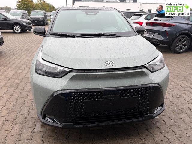 Toyota Aygo X Pulse 1.5 Hybrid 115PS CVT/AUTOMATIK, 3 Jahre Garantie, 17" Alufelgen, Uni-Lackierung Tarragon /Dach schwarz, Privacy-Glas, Sitzheizung, R&uuml;ckfahrkamera, Klimaautomatik, Audiosystem 9" + Smartphone-Integration, Lederlenkrad, ACC, ZV mit Fernbedienung 