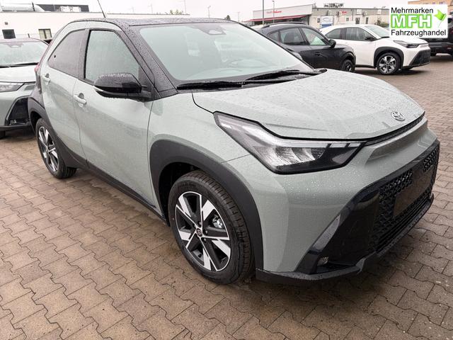 Toyota Aygo X Pulse 1.5 Hybrid 115PS CVT/AUTOMATIK, 3 Jahre Garantie, 17" Alufelgen, Uni-Lackierung Tarragon /Dach schwarz, Privacy-Glas, Sitzheizung, R&uuml;ckfahrkamera, Klimaautomatik, Audiosystem 9" + Smartphone-Integration, Lederlenkrad, ACC, ZV mit Fernbedienung 