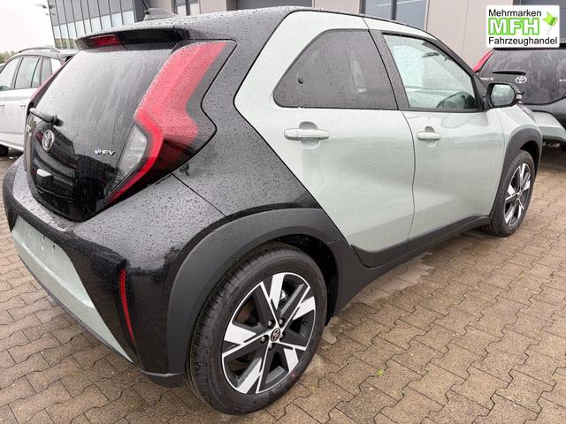 Toyota Aygo X Pulse 1.5 Hybrid 115PS CVT/AUTOMATIK, 3 Jahre Garantie, 17" Alufelgen, Uni-Lackierung Tarragon /Dach schwarz, Privacy-Glas, Sitzheizung, R&uuml;ckfahrkamera, Klimaautomatik, Audiosystem 9" + Smartphone-Integration, Lederlenkrad, ACC, ZV mit Fernbedienung 