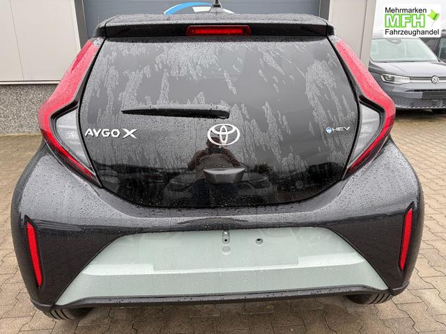 Toyota Aygo X Pulse 1.5 Hybrid 115PS CVT/AUTOMATIK, 3 Jahre Garantie, 17" Alufelgen, Uni-Lackierung Tarragon /Dach schwarz, Privacy-Glas, Sitzheizung, R&uuml;ckfahrkamera, Klimaautomatik, Audiosystem 9" + Smartphone-Integration, Lederlenkrad, ACC, ZV mit Fernbedienung 