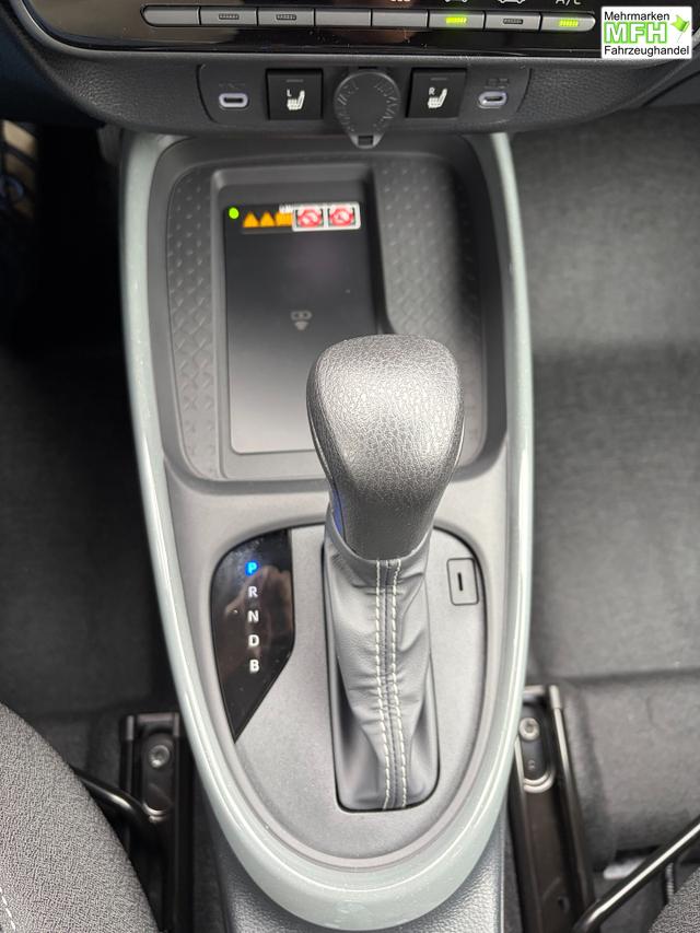 Toyota Aygo X Pulse 1.5 Hybrid 115PS CVT/AUTOMATIK, 3 Jahre Garantie, 17" Alufelgen, Uni-Lackierung Tarragon /Dach schwarz, Privacy-Glas, Sitzheizung, R&uuml;ckfahrkamera, Klimaautomatik, Audiosystem 9" + Smartphone-Integration, Lederlenkrad, ACC, ZV mit Fernbedienung 