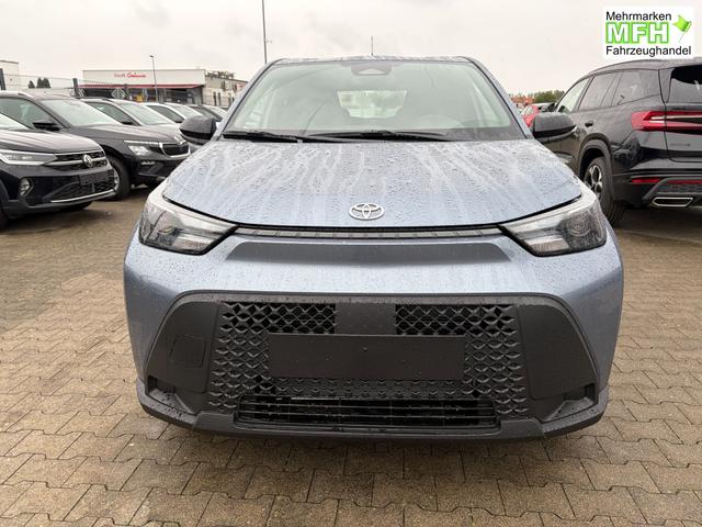 Toyota Aygo X Play 1.5 Hybrid 115PS CVT/AUTOMATIK, Celestite Grey Metallic , 3 Jahre Garantie, 17" Alufelgen, Sitzheizung, R&uuml;ckfahrkamera, Klimaautomatik, Audiosystem 9" + Smartphone-Integration, Lederlenkrad, ACC, ZV mit Fernbedienung 