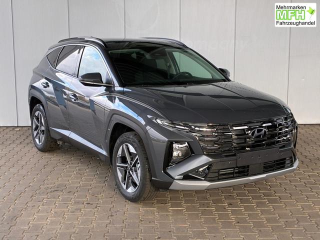 Hyundai TUCSON E-Motion 1.6 T-GDi 2WD HEV / Panoramadach ACC LED Sitz + Lenkradheizung Navi PDC V&H Kamera Alu 18" 