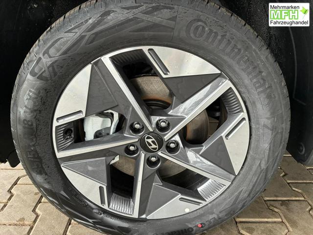 Hyundai TUCSON E-Motion 1.6 T-GDi 2WD HEV / Panoramadach ACC LED Sitz + Lenkradheizung Navi PDC V&H Kamera Alu 18" 