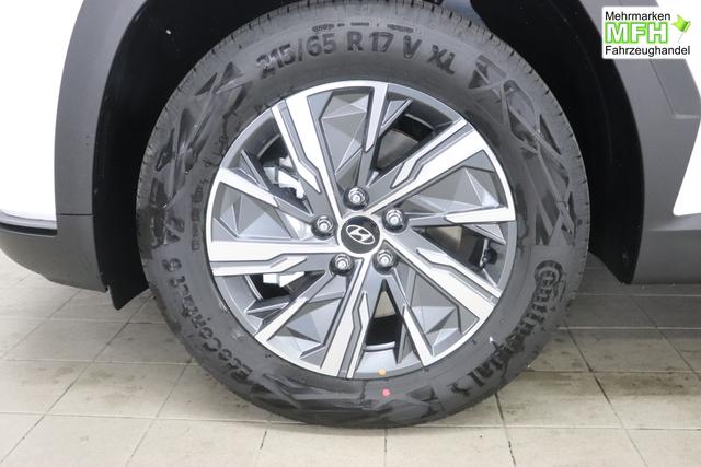 Hyundai Tucson 1.6 T-GDI 6MT 2WD Family MY23 110kW Polar White Sitzpolsterung in Stoff Schwarz