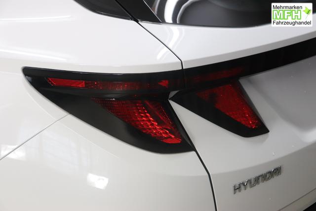 Hyundai Tucson 1.6 T-GDI 6MT 2WD Family MY23 110kW Polar White Sitzpolsterung in Stoff Schwarz
