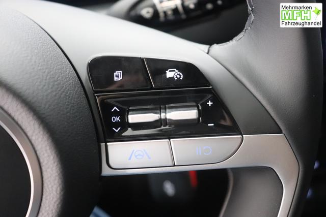 Hyundai Tucson 1.6 T-GDI 6MT 2WD Family MY23 110kW Polar White Sitzpolsterung in Stoff Schwarz