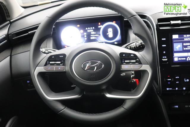Hyundai Tucson 1.6 T-GDI 6MT 2WD Family MY23 110kW Polar White Sitzpolsterung in Stoff Schwarz