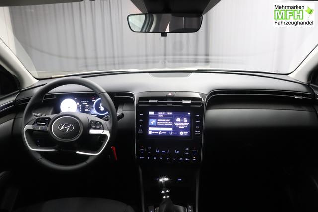 Hyundai Tucson 1.6 T-GDI 6MT 2WD Family MY23 110kW Polar White Sitzpolsterung in Stoff Schwarz