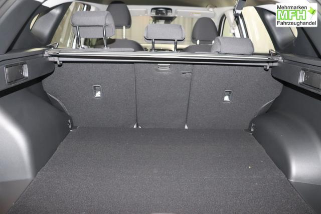 Hyundai Tucson 1.6 T-GDI 6MT 2WD Family MY23 110kW Polar White Sitzpolsterung in Stoff Schwarz