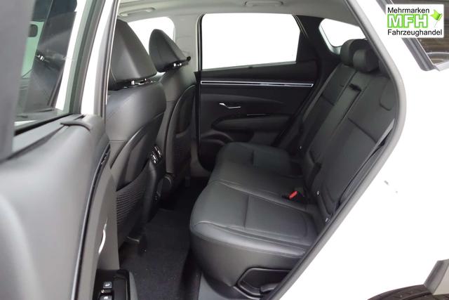 Tucson NX4 Prestige Line 1,6 T-GDi 4WD 48V DCT t1bp0-O1 Serenty White