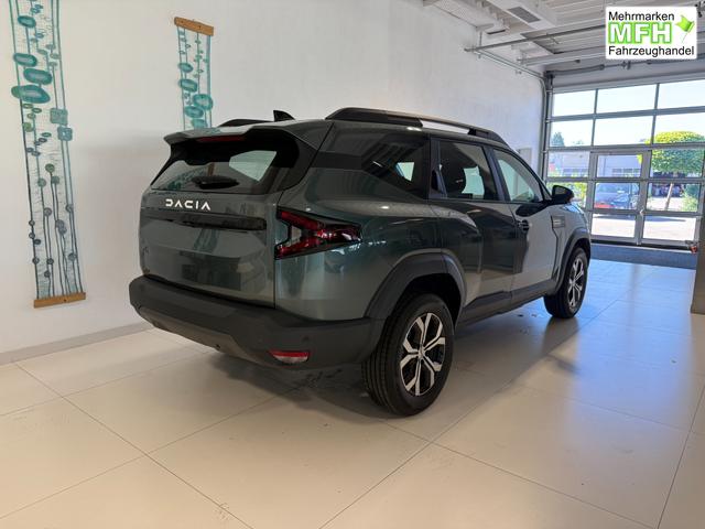 Dacia Bigster Zeder Gruen