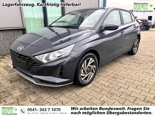Hyundai i20 - Comfort 1.2i 79PS, AURORA-GRAU METALLIC, 16" ALUFELGEN, 5 Jahre Garantie, NAVIGATION 10,25", Klima, Parksensoren hinten, Rückfahrkamera, Alarm, Lederlenkrad, Tempomat, Armlehne vorne, Reserverad, 4x elektr. Fensterheber, Fernlicht-Assistent