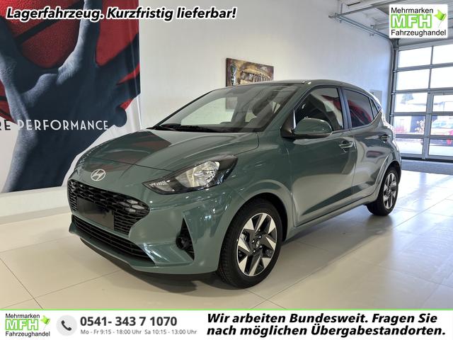 Hyundai i10 - GO+ 1.2 AMT 58 kW (79 PS) Klimaautomatik, Navigationssystem, Apple CarPlay & Android Auto, Sitzheizung, Lenkradheizung, Einparkhilfe hinten, R&uuml;ckfahrkamera, Privacy Glass, 15" Leichtmetallfelgen, uvm.