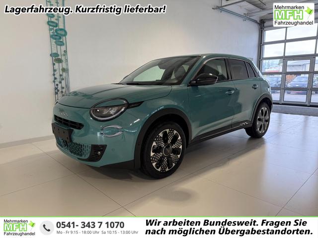 Fiat 600 - La Prima Hybrid 1.2 T3 107 kW (145 PS) DCT, Winterpaket, Dolce Vita Paket, Ledersitze Canneloni, Chrom Akzente, Klimaautomatik, Einparkhilfe hinten, LED-Scheinwerfer, Volldigitales Kombiinstrument, Fernlichtassistent, uvm.
