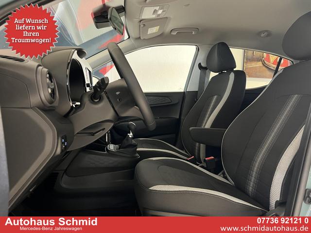 Hyundai i10 - GO+ 1.2 AMT 58 kW (79 PS) Klimaautomatik, Navigationssystem, Apple CarPlay & Android Auto, Sitzheizung, Lenkradheizung, Einparkhilfe hinten, R&uuml;ckfahrkamera, Privacy Glass, 15" Leichtmetallfelgen, uvm.