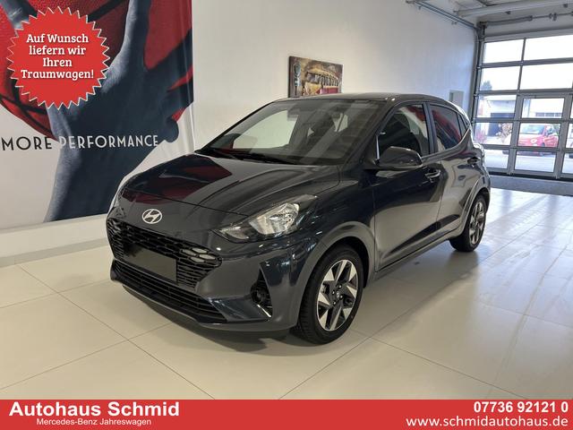Hyundai i10 - GO+ 1.2 AMT 58 kW (79 PS) Klimaautomatik, Navigationssystem, Apple CarPlay & Android Auto, Sitzheizung, Lenkradheizung, Einparkhilfe hinten, R&uuml;ckfahrkamera, Privacy Glass, 15" Leichtmetallfelgen, uvm.