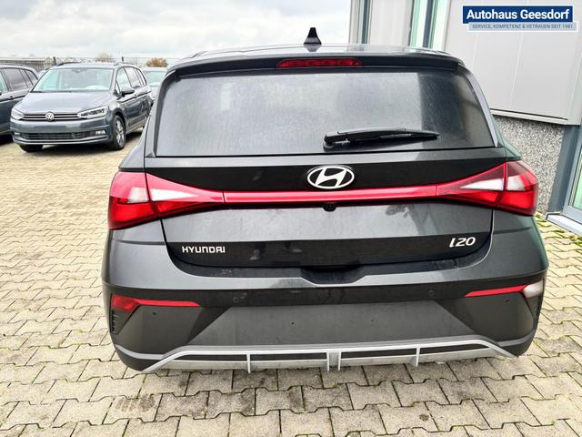 Hyundai i20 Family 1.2i 79PS, SCHWARZ-METALLIC, 16" ALUFELGEN, 5 Jahre Garantie, WINTER-PAKET, KLIMAAUTOMATIK, Abgedunkelte Scheiben, NAVIGATION 10,25", Parksensoren hinten, Rückfahrkamera, Alarm, Lederlenkrad, Tempomat, Armlehne vorne, Reserverad 