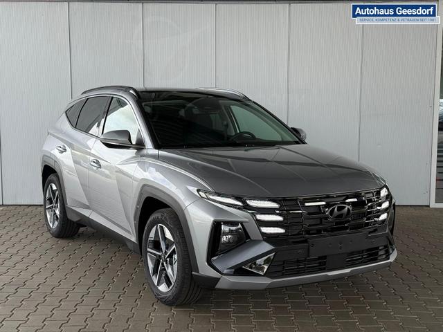 Hyundai TUCSON E-Motion 1.6 T-GDI 2WD 48V DCT / Panoramadach ACC Sitz + Lenkradheizung LED Navi PDC V&H Kamera Alu 18" 