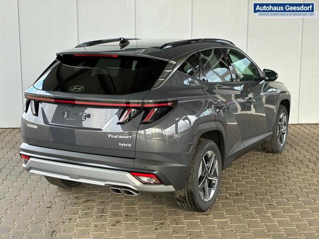 Hyundai TUCSON E-Motion 1.6 T-GDi 2WD HEV / Panoramadach ACC LED Sitz + Lenkradheizung Navi PDC V&H Kamera Alu 18" 