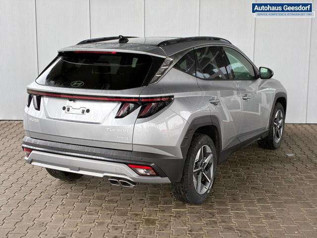 Hyundai TUCSON E-Motion 1.6 T-GDi 2WD HEV / Panoramadach ACC LED Sitz + Lenkradheizung Navi PDC V&H Kamera Alu 18" 