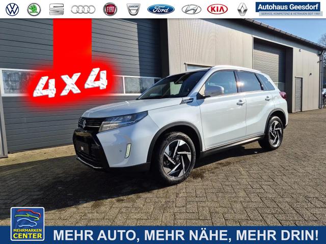 Lagerfahrzeug Suzuki Vitara - 1.4 Boosterjet 129PS ALLGRIP 4x4 HYBRID Comfort  Allrad Teilleder mit Alcantara Navi Klimaautomatik Sitzheizung ACC PDC v h Rückf.Kamera Suzuki-Radio Apple CarPlay Android Auto Touchscreen 2xKeyless 17-LM