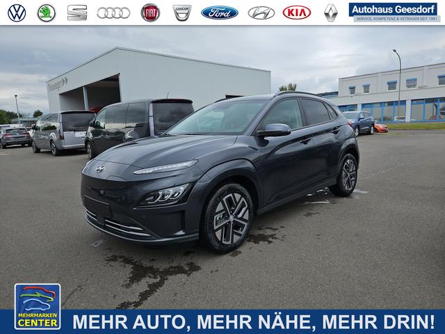 Lagerfahrzeug Hyundai KONA - Trend Elektro 100 kW (136 PS) 39,2kWh Klimaautomatik, Radio mit DAB, Apple CarPlay, Android Auto, Bluetooth Freisprecheinrichtung, Rückfahrkamera, Lenkradheizung, Sitzheizung, Lichtsensor, Regensensor, Voll-LED-Scheinwerfer, Einparkhilfe vorne, 17" Leichtmetal