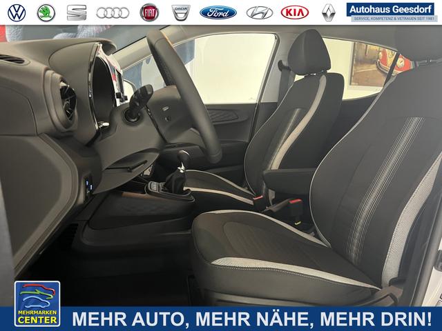 Lagerfahrzeug Hyundai i10 - GO  1.2 MT 58 kW (79 PS) Klimaautomatik, Navigationssystem, Apple CarPlay & Android Auto, Sitzheizung, Lenkradheizung, Einparkhilfe hinten, Rückfahrkamera, Privacy Glass, 15" Leichtmetallfelgen, uvm.
