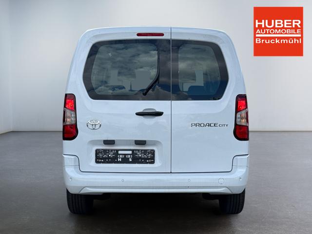Toyota Proace City Verso 1,2 L2 Business 7 Sitzer Klima Einparkhilfe Apple Tempomat DAB 10 Zoll Display Regensensor 