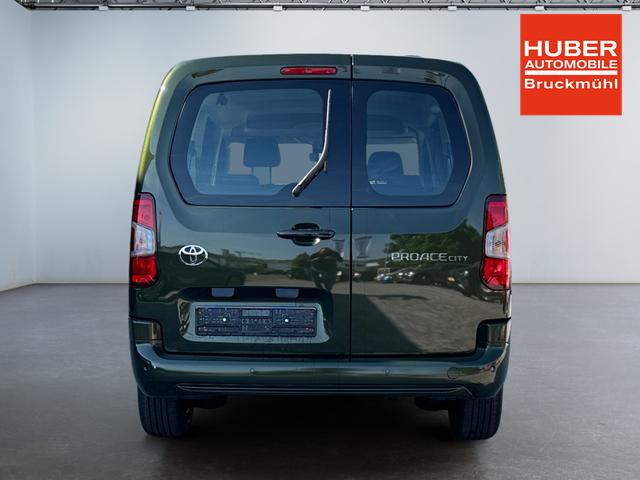 Toyota Proace City Verso 1,2 L2 Business 7 Sitzer Klima Einparkhilfe Apple Tempomat DAB 10 Zoll Display Regensensor 