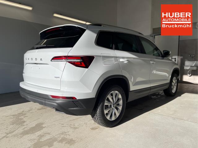 Skoda / Karoq / Wei&szlig; / / / 150PS TDI DSG 4x4 AHK+Navi+ACC+Kamera+Sitzheiz+eHeck+GV5