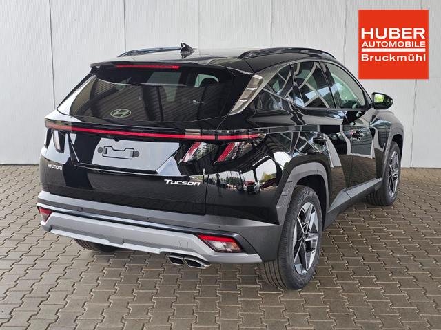 Hyundai TUCSON E-Motion 1.6 T-GDI 2WD 48V DCT / Panoramadach ACC Sitz + Lenkradheizung LED Navi PDC V&H Kamera Alu 18" 