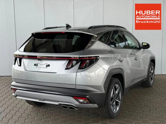 Hyundai TUCSON E-Motion 1.6 T-GDI 2WD 48V DCT / Panoramadach ACC Sitz + Lenkradheizung LED Navi PDC V&H Kamera Alu 18" 