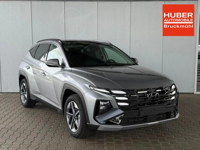 Hyundai TUCSON E-Motion 1.6 T-GDI 2WD 48V DCT / Panoramadach ACC Sitz + Lenkradheizung LED Navi PDC V&H Kamera Alu 18" 