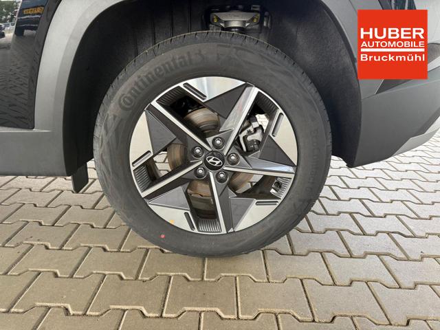 Hyundai TUCSON E-Motion 1.6 T-GDI 2WD 48V DCT / Panoramadach ACC Sitz + Lenkradheizung LED Navi PDC V&H Kamera Alu 18" 