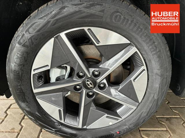 Hyundai TUCSON E-Motion 1.6 T-GDi 2WD HEV / Panoramadach ACC LED Sitz + Lenkradheizung Navi PDC V&H Kamera Alu 18" 
