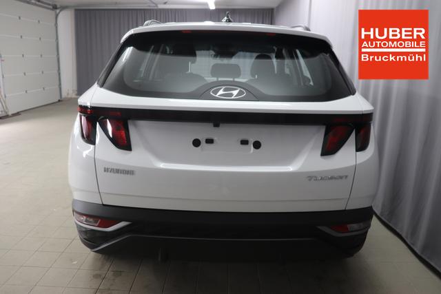 Hyundai Tucson 1.6 T-GDI 6MT 2WD Family MY23 110kW Polar White Sitzpolsterung in Stoff Schwarz