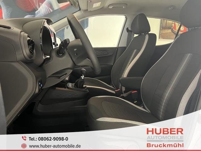 Hyundai i10 - GO+ 1.2 MT 58 kW (79 PS) Klimaautomatik, Navigationssystem, Apple CarPlay & Android Auto, Sitzheizung, Lenkradheizung, Einparkhilfe hinten, Rückfahrkamera, Privacy Glass, 15" Leichtmetallfelgen, uvm.